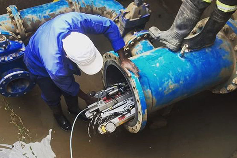 Pipe inspection with tethered robotic crawlers